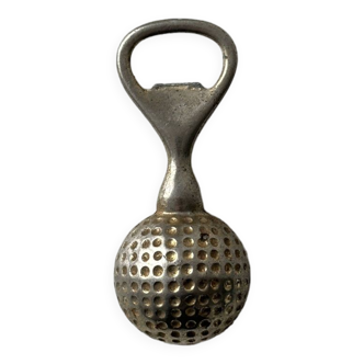 Golf ball bottle opener