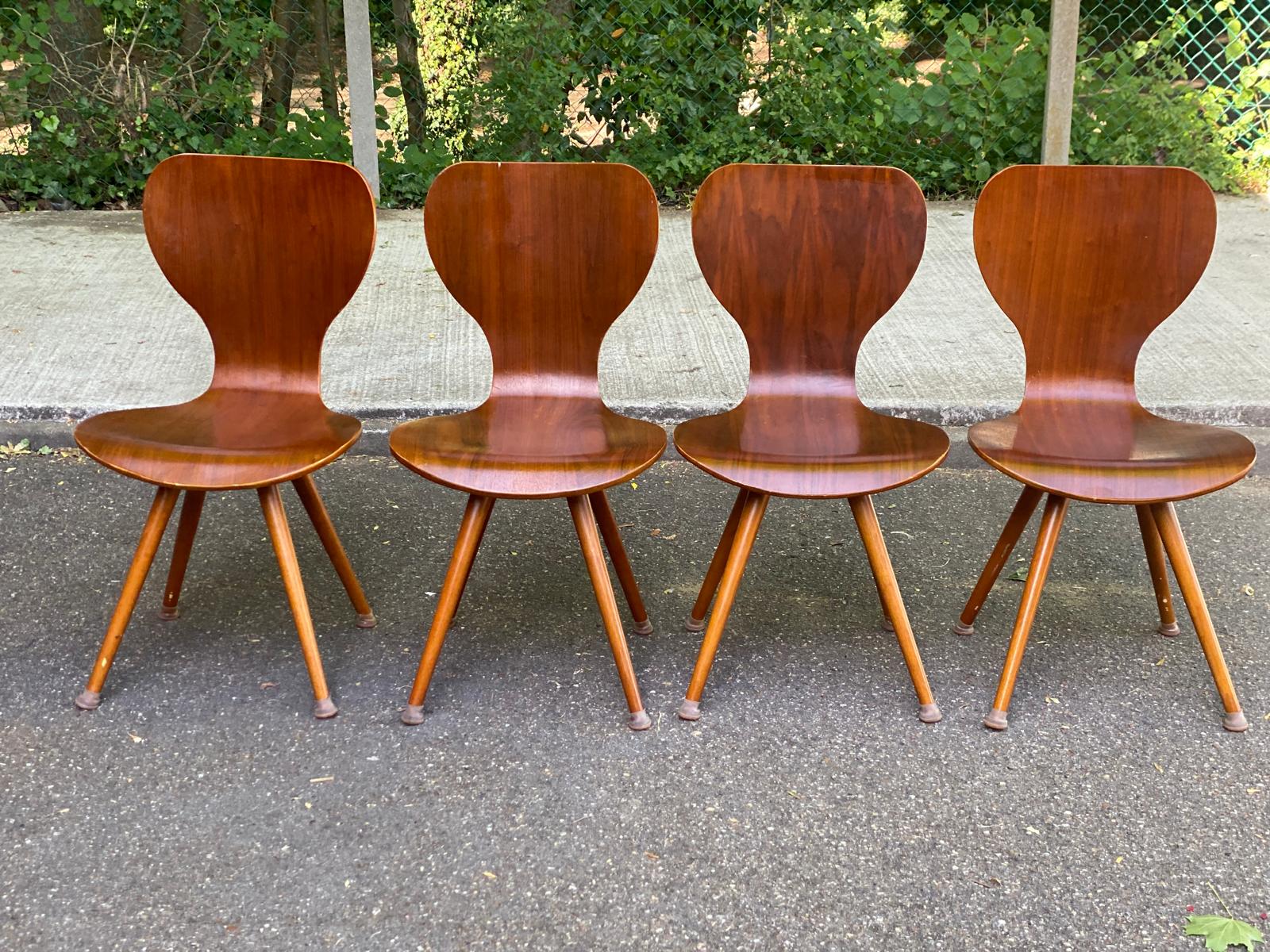 4 vintage Scandinavian dining chairs in curved walnut.