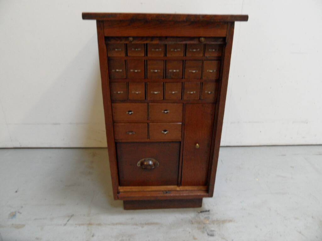 Antique watchmakers cabinet with drawers