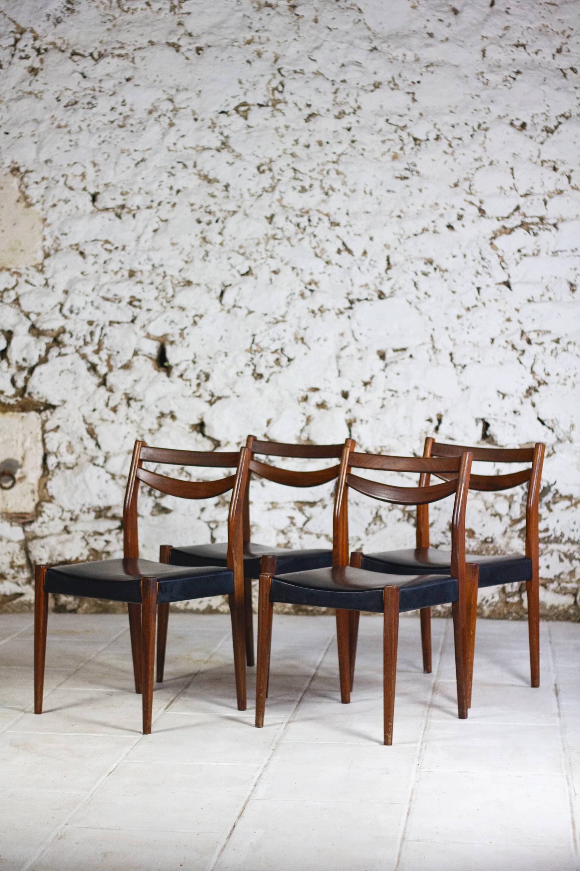 4 vintage Scandinavian chairs in teak and imitation leather, 1960