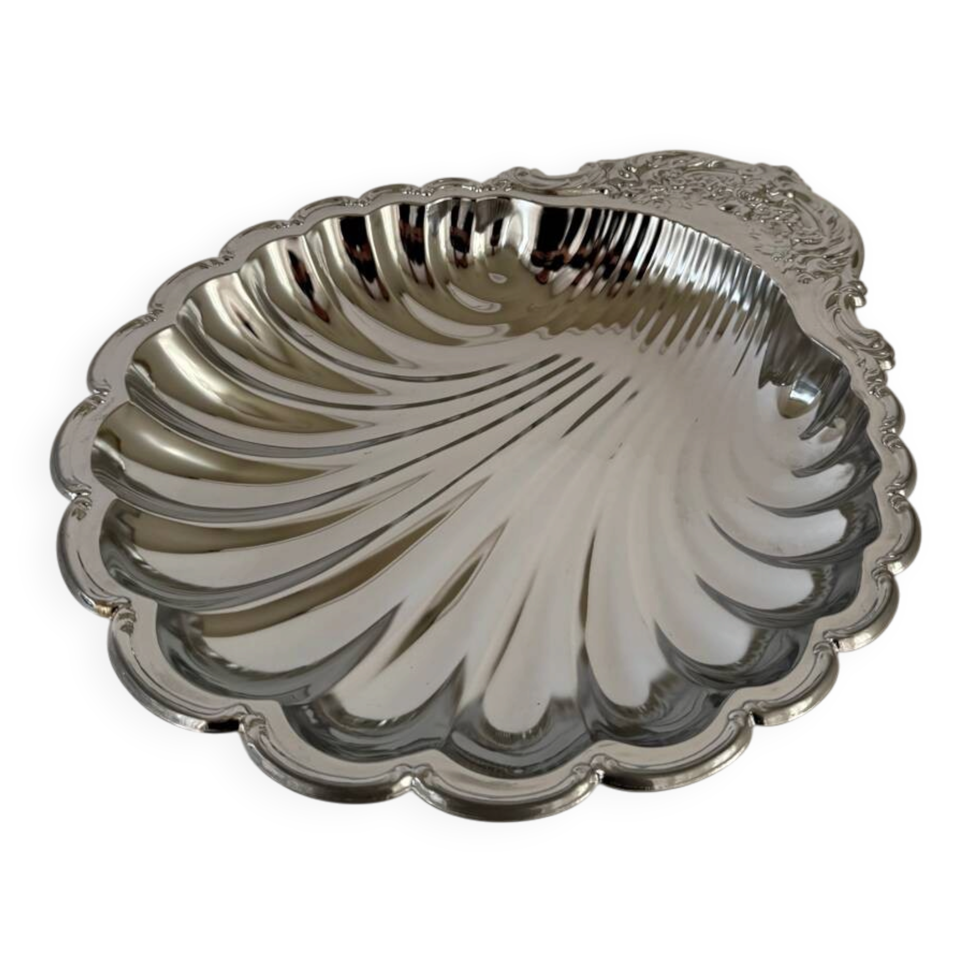 Large silver-plated serving dish in the shape of a vintage shell.