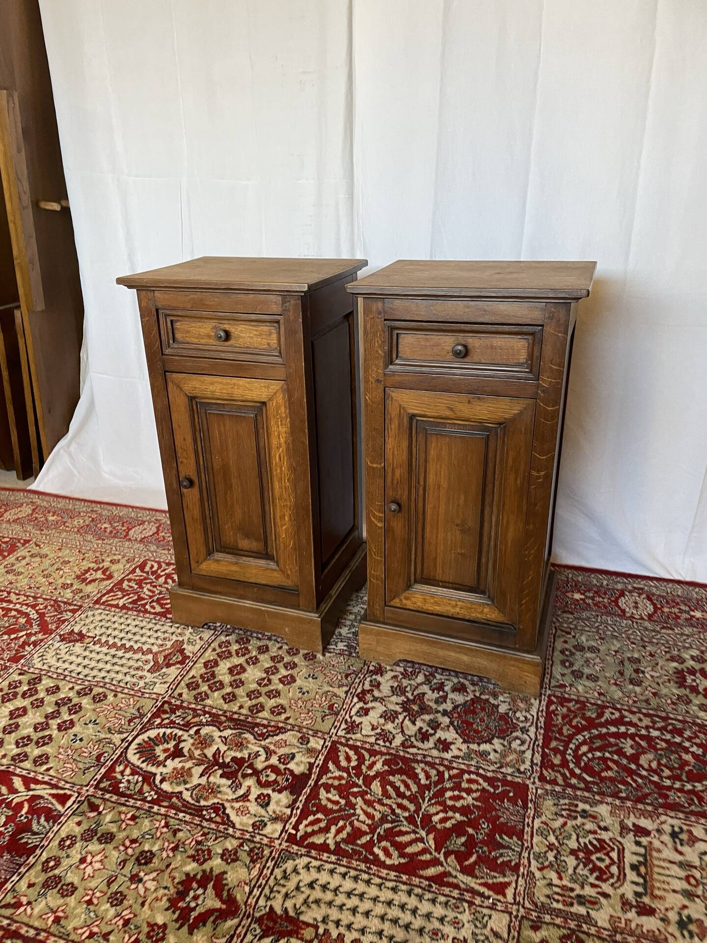 Pair of antique solid oak bedside tables