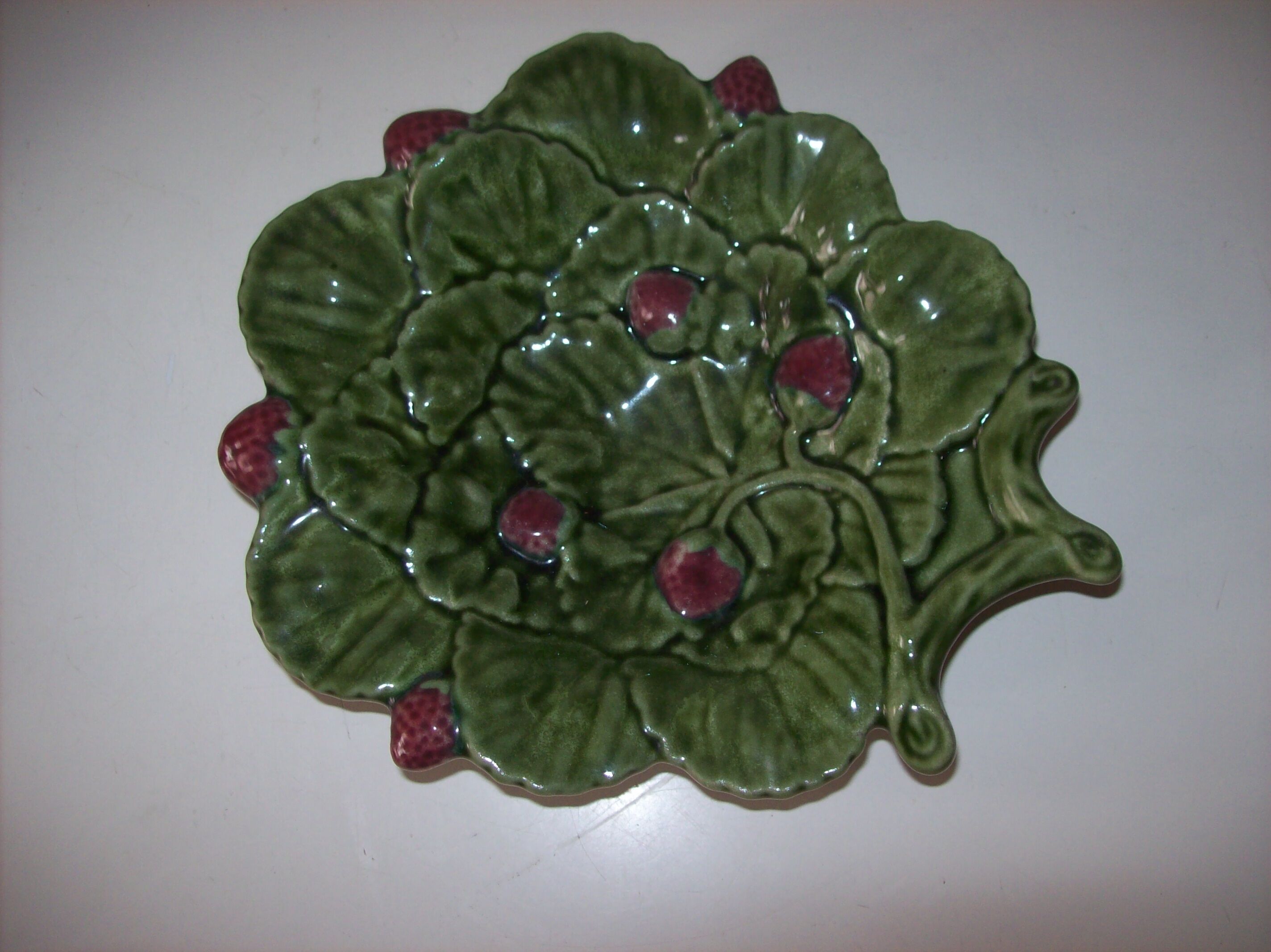 Tidy with raspberry decoration