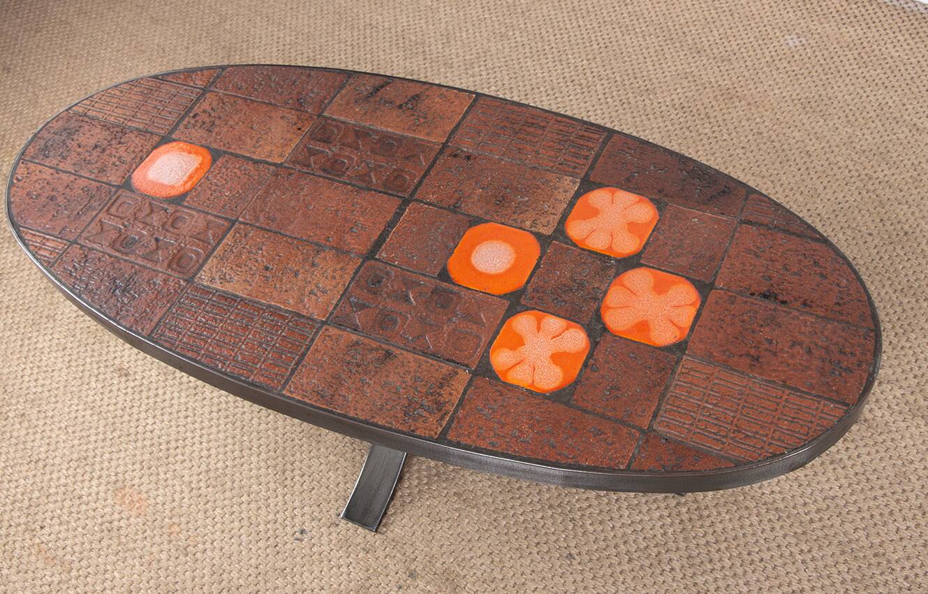 Coffee table in lava stone, ceramic and steel by Jean Jaffeux 1960.