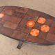 Coffee table in lava stone, ceramic and steel by Jean Jaffeux 1960.