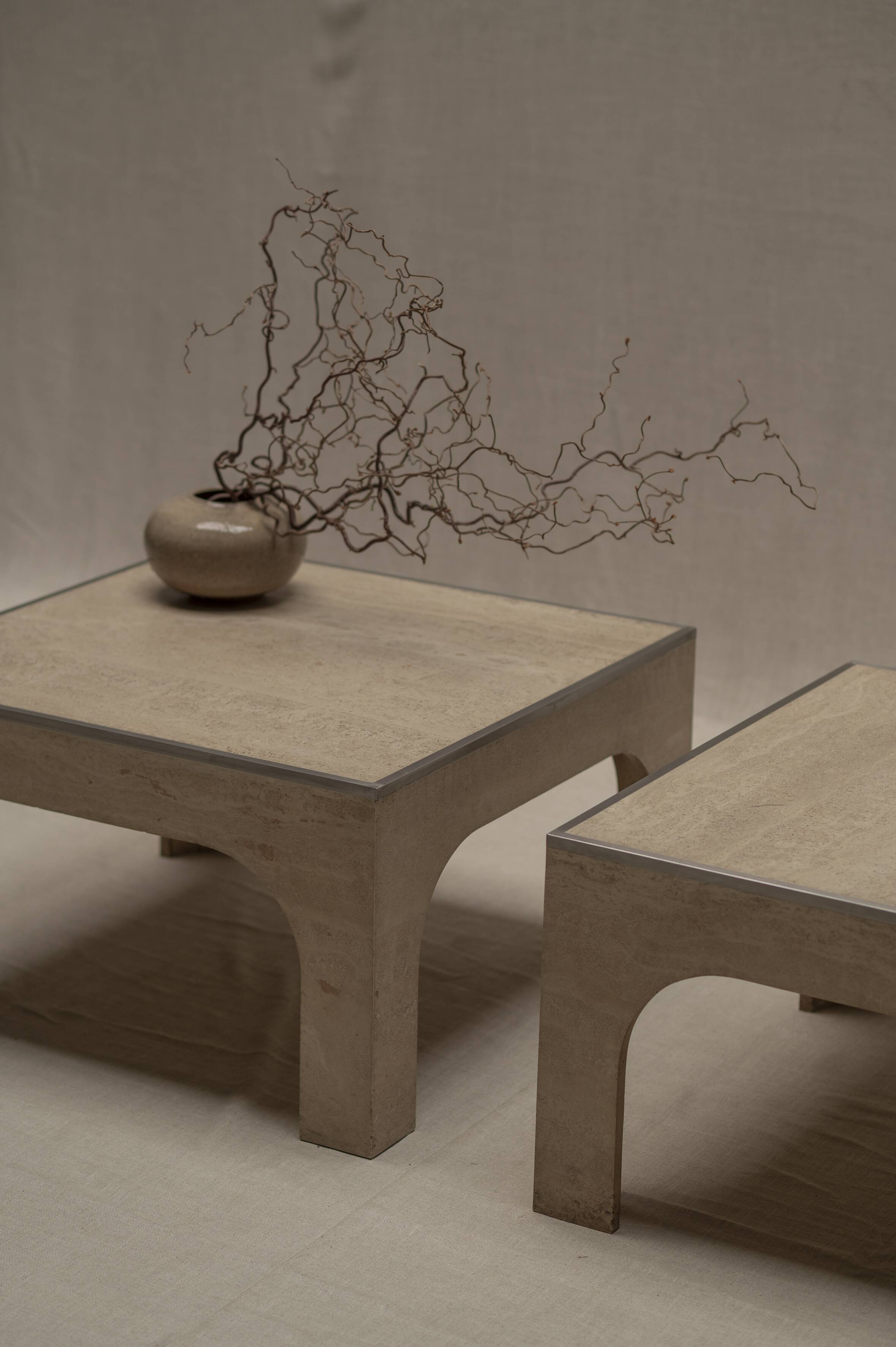 Architectural set of travertine coffee tables