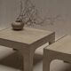 Architectural set of travertine coffee tables