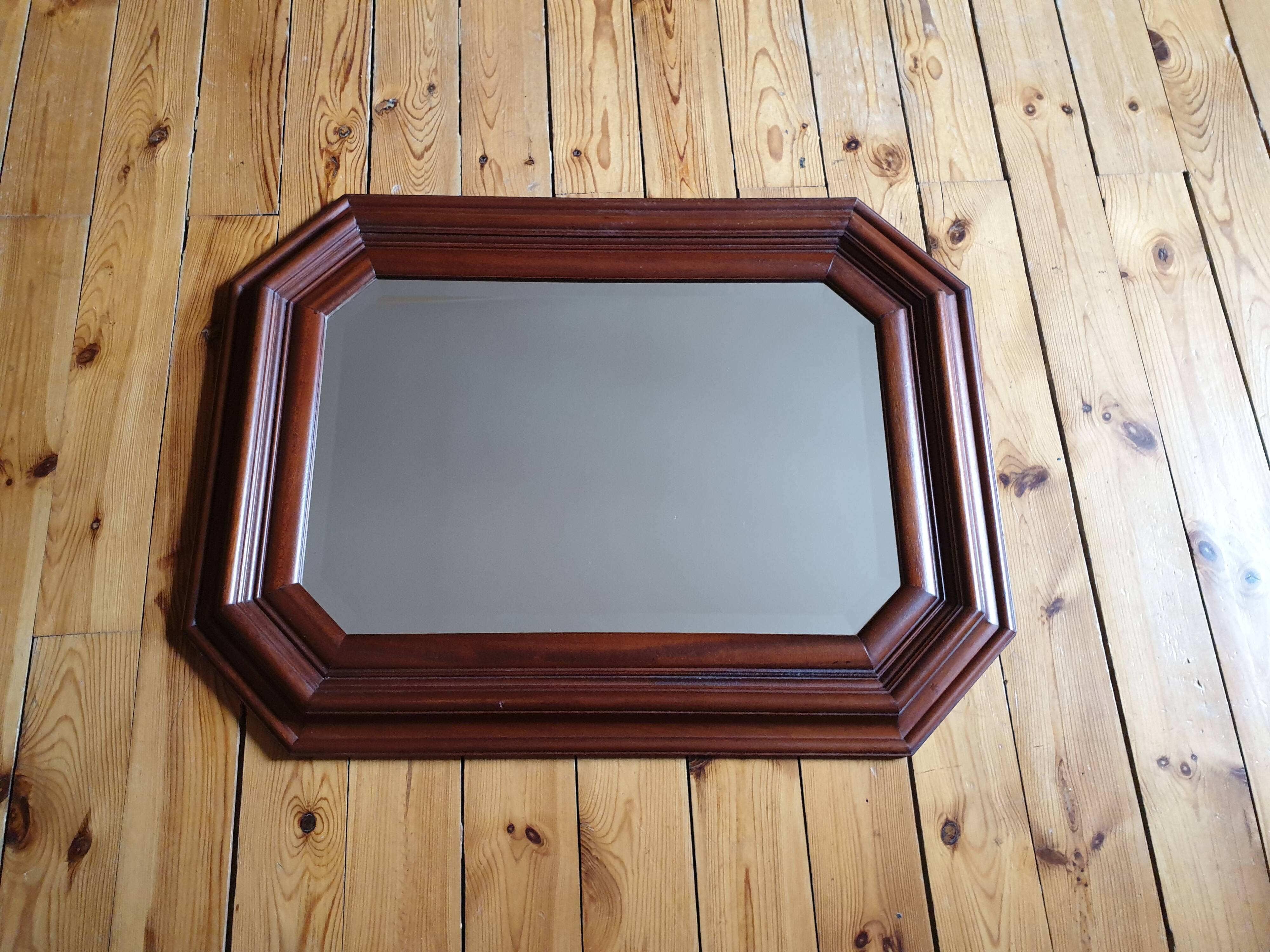 Large beveled mirror in cherry wood frame