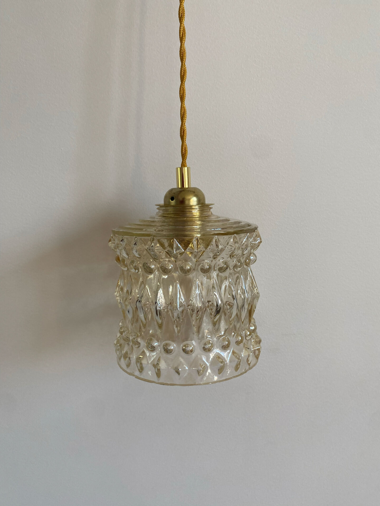 Vintage amber glass suspension globe