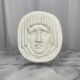 Masque de style visage en bas-relief antique