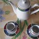 Coffee service cups saucers and coffee maker