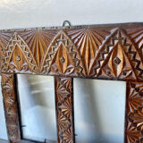 Double frame intricately carved wood