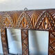 Double frame intricately carved wood