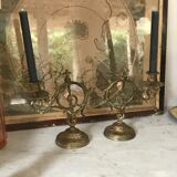 Pair of brass candlesticks with tassels