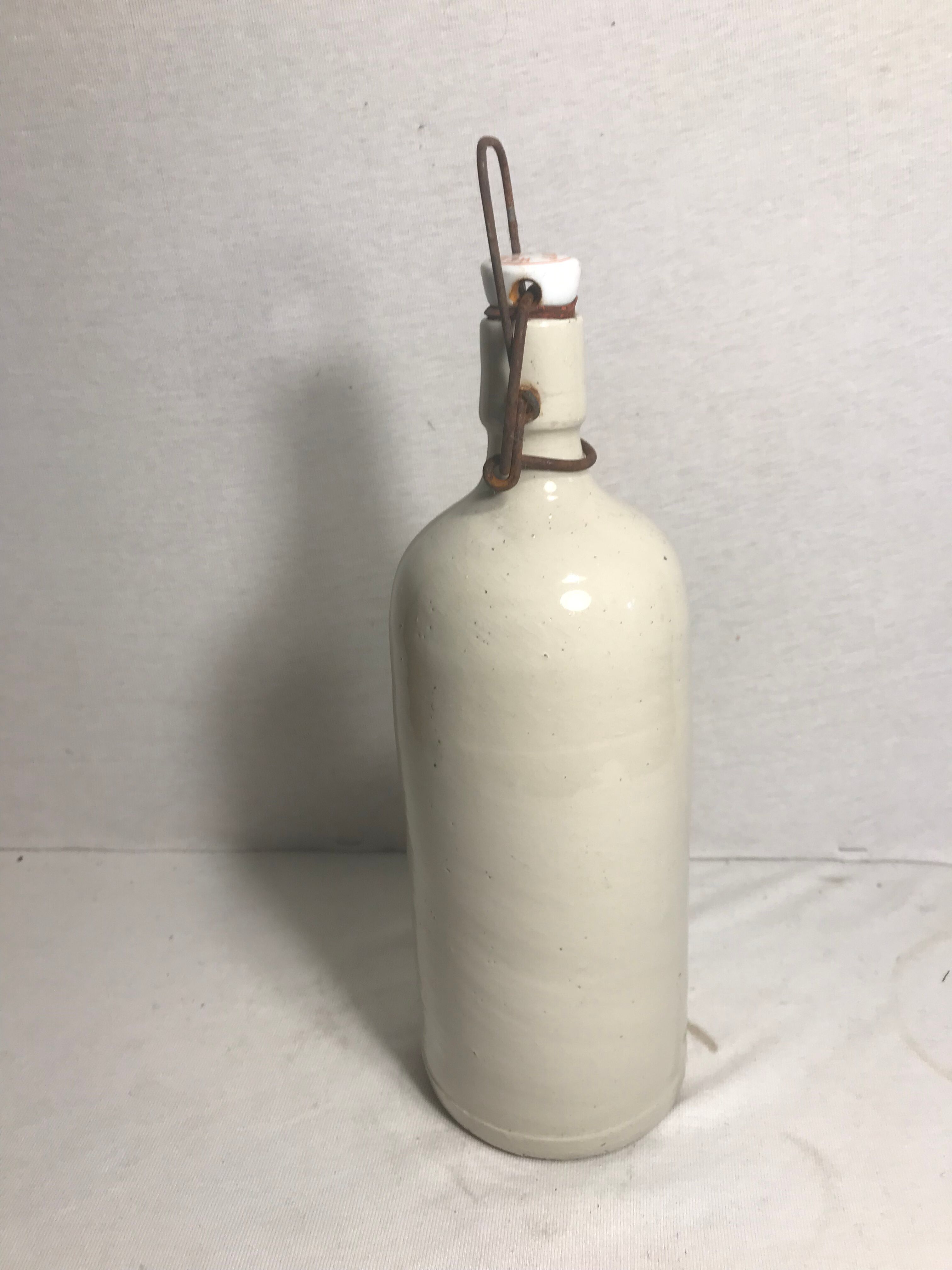 Old bottle enamelled sandstone