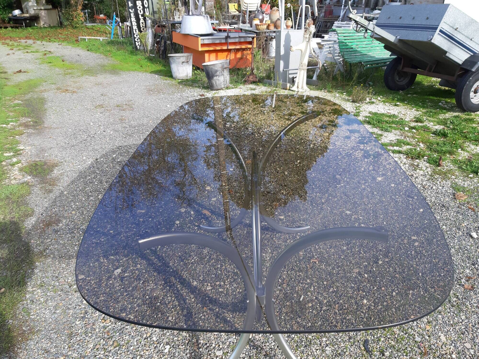 Vintage table of the 70s in chrome and smoked glass