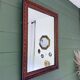 Antique mirror in carved wood and mercury 48x63cm