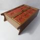 Rattan doll cabinet