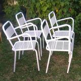 Set of 4 stackable perforated garden armchairs