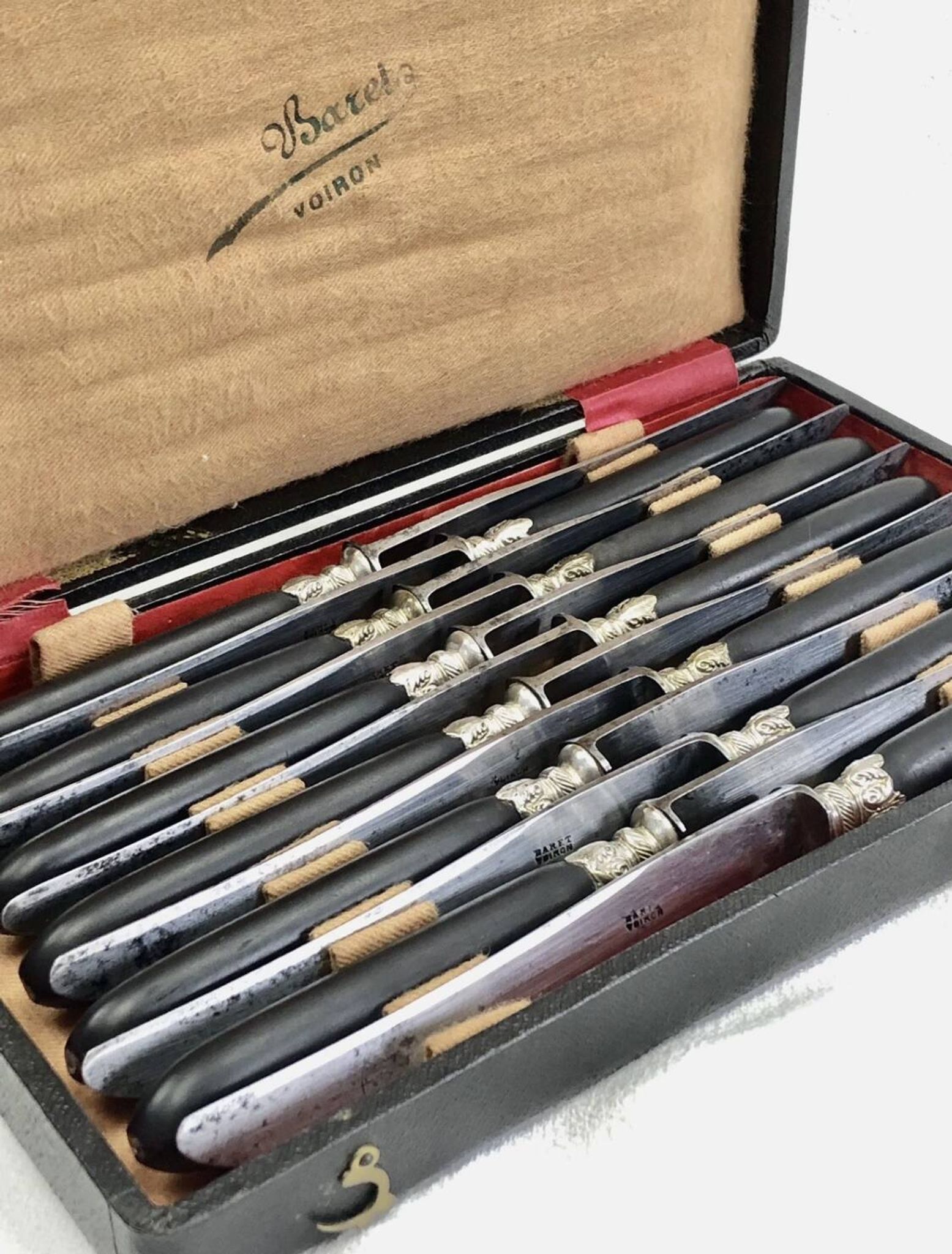 12 antique large table knives with ebony handles from the Napoleonic III period.