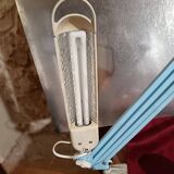 Articulated blue desk lamp