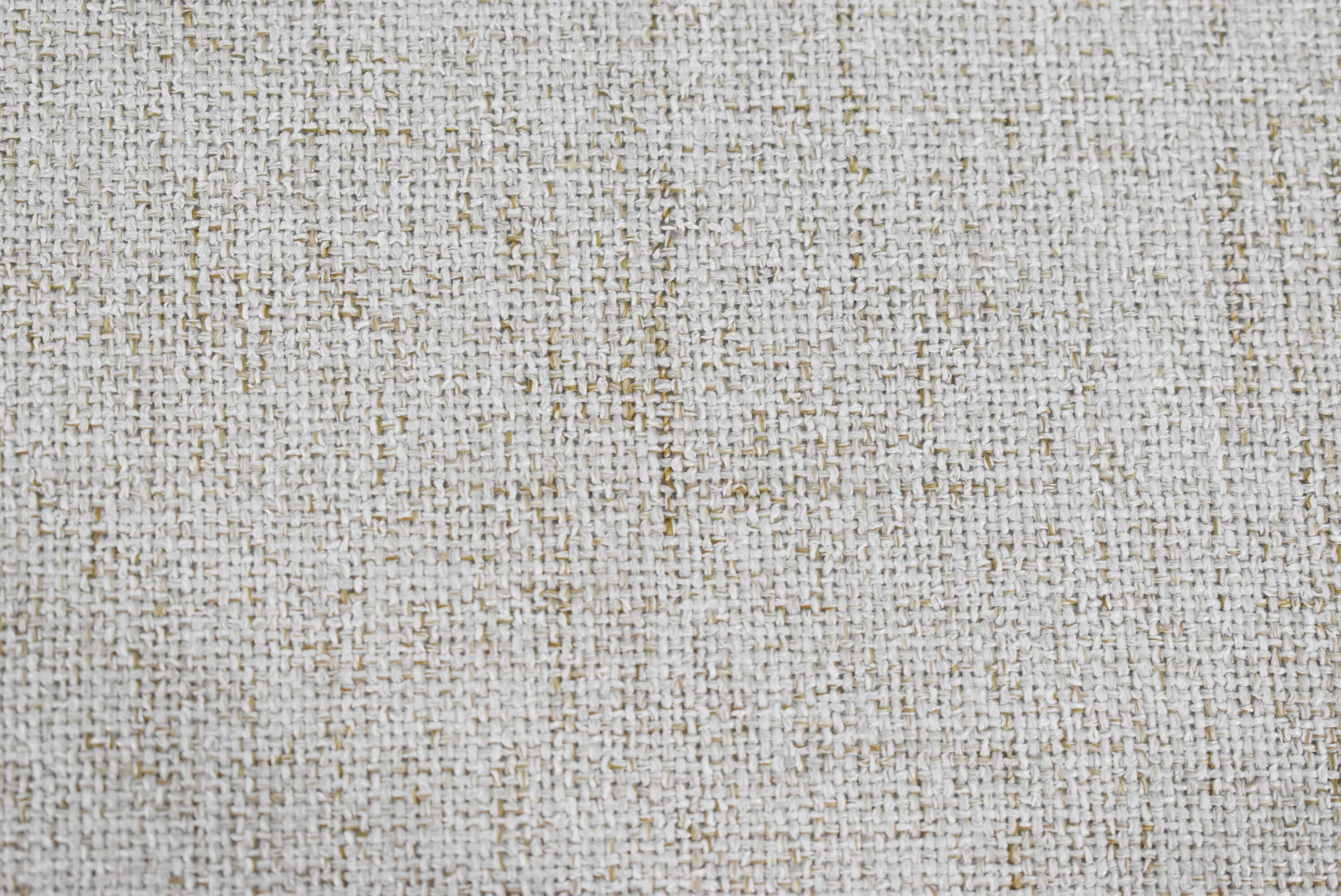 Canapé deux places beige de style scandinave