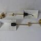 Pair of adjustable brass wall lamps after koch & lowy