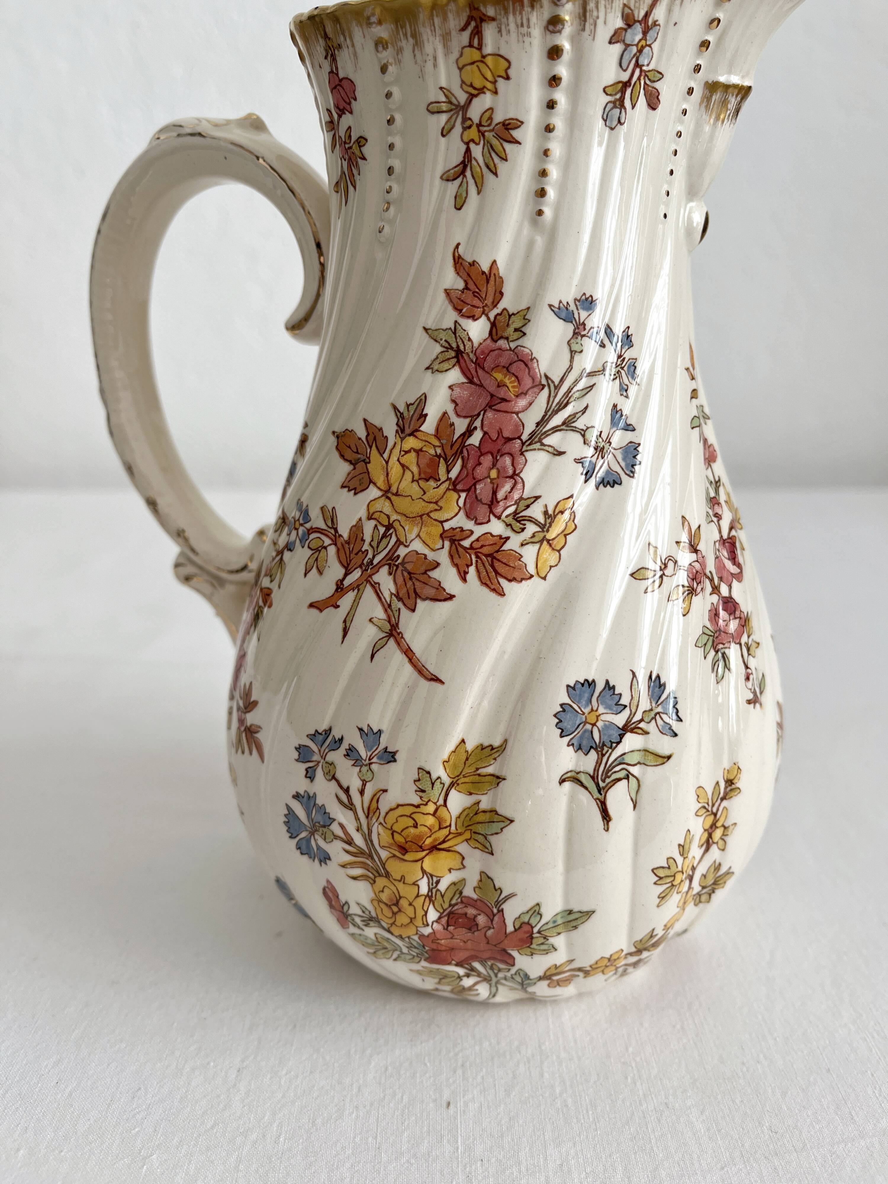 Polychrome ironstone milk jug "Louis XV" U&C Sarreguemines