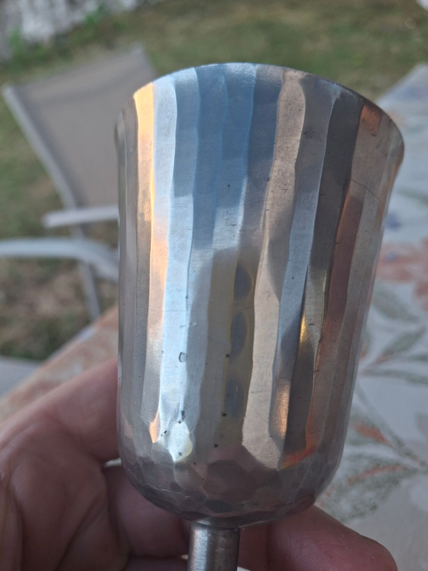 Footed glass in pewter