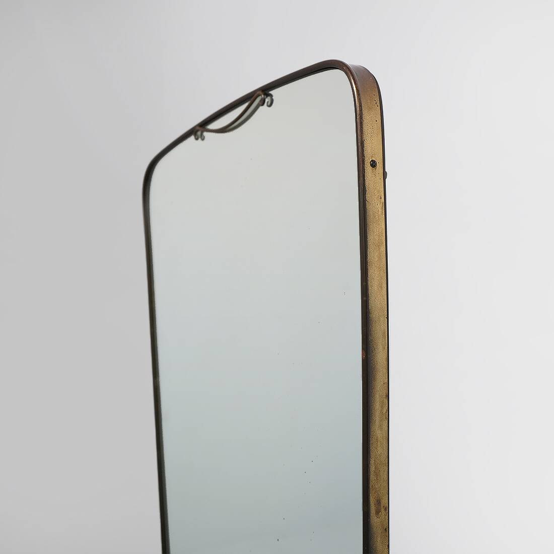 Wall mirror with brass frame, 1950s