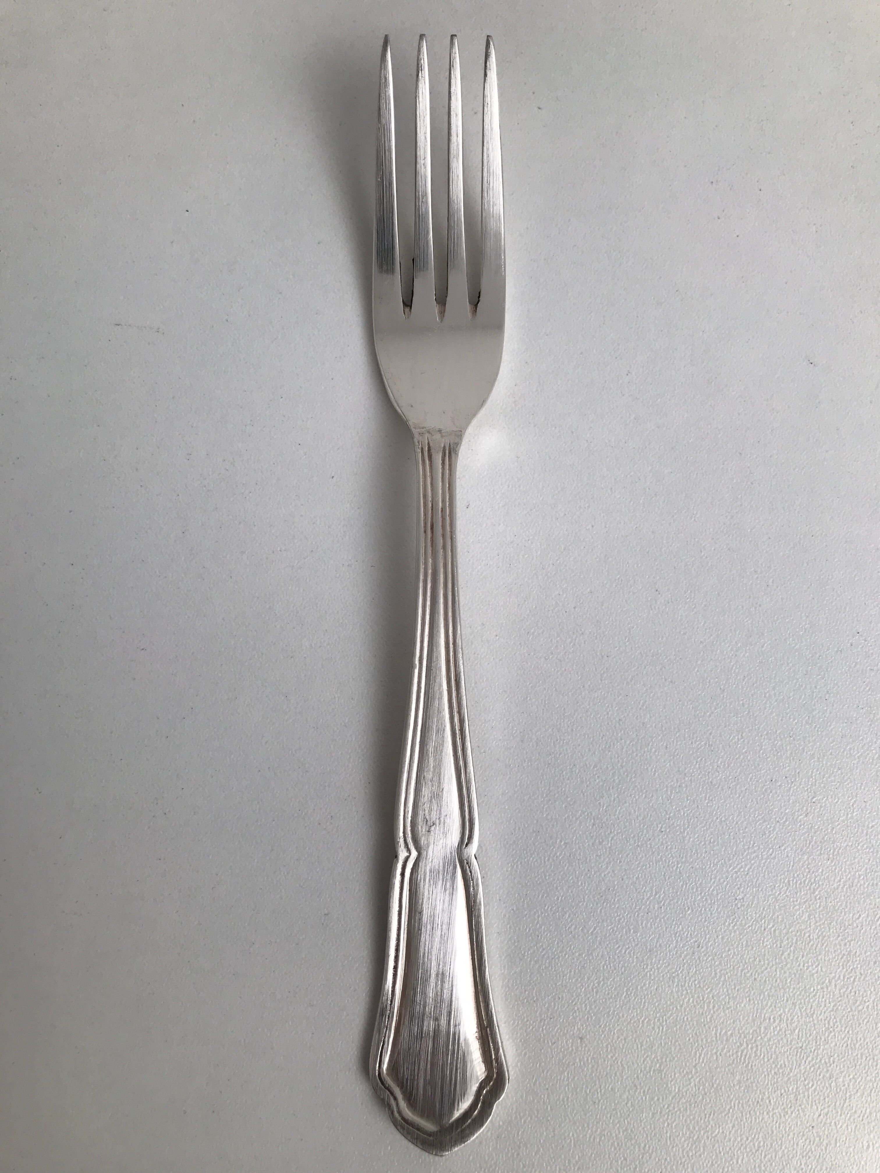 5 Small vintage metal silver forks
