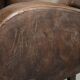 Comfortable sheepskin armchair with matching piping and a timeless look