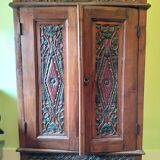Indonesian cabinet in carved and painted exotic wood