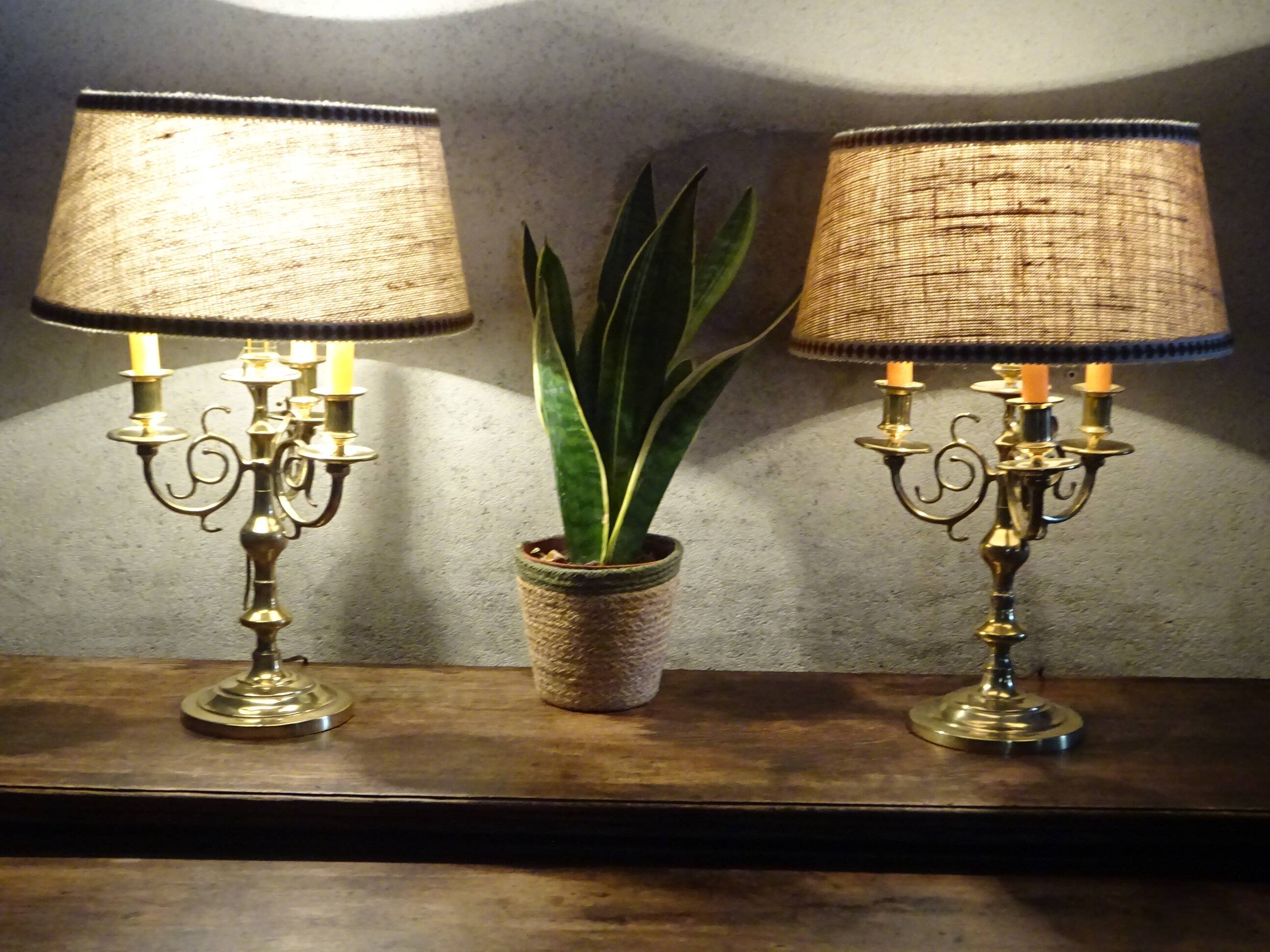 Copper candlesticks adapted as bedside lamps, the pair.