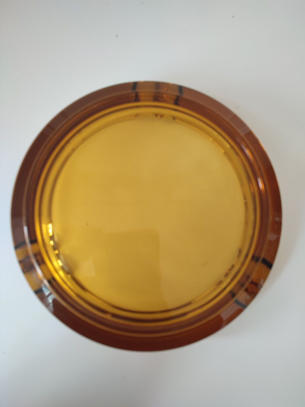 Amber glass ashtray