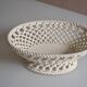 Woven ceramic oval fruit bowl or dish