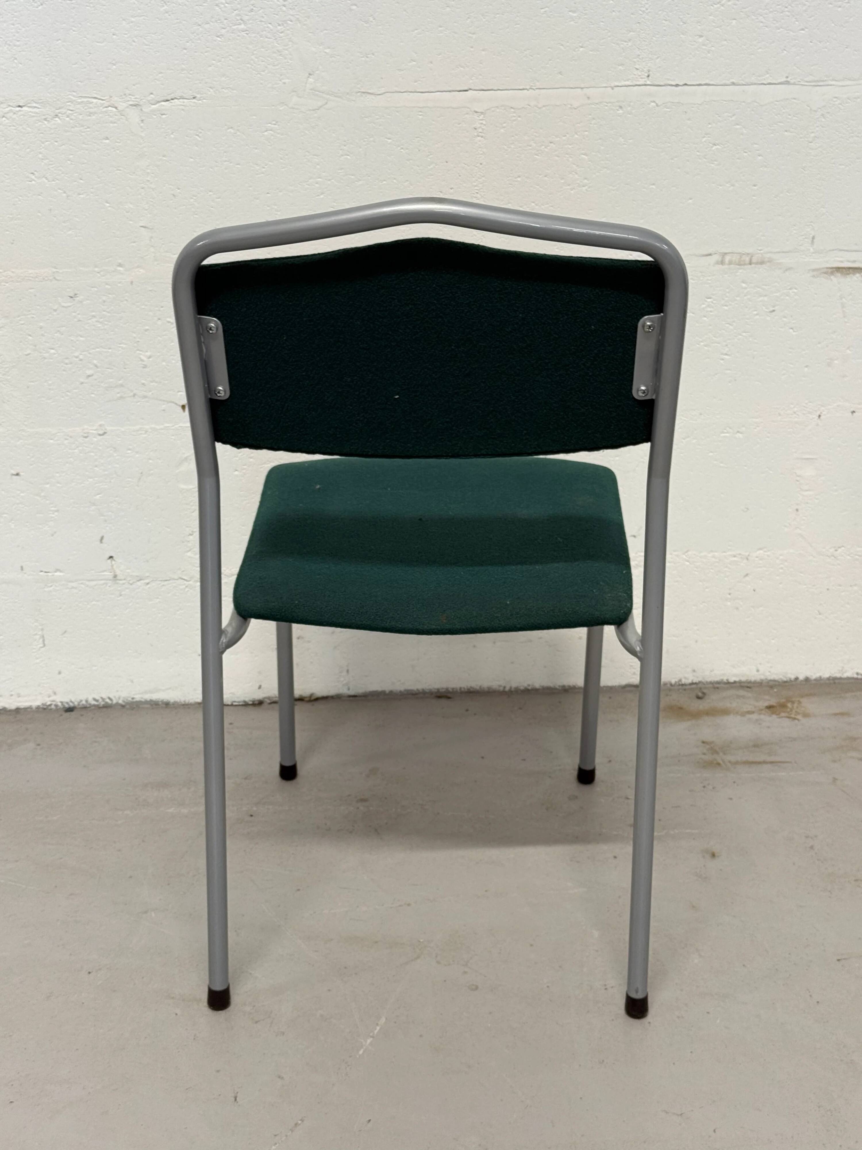 Set of 5 green padded vintage stackable chairs.