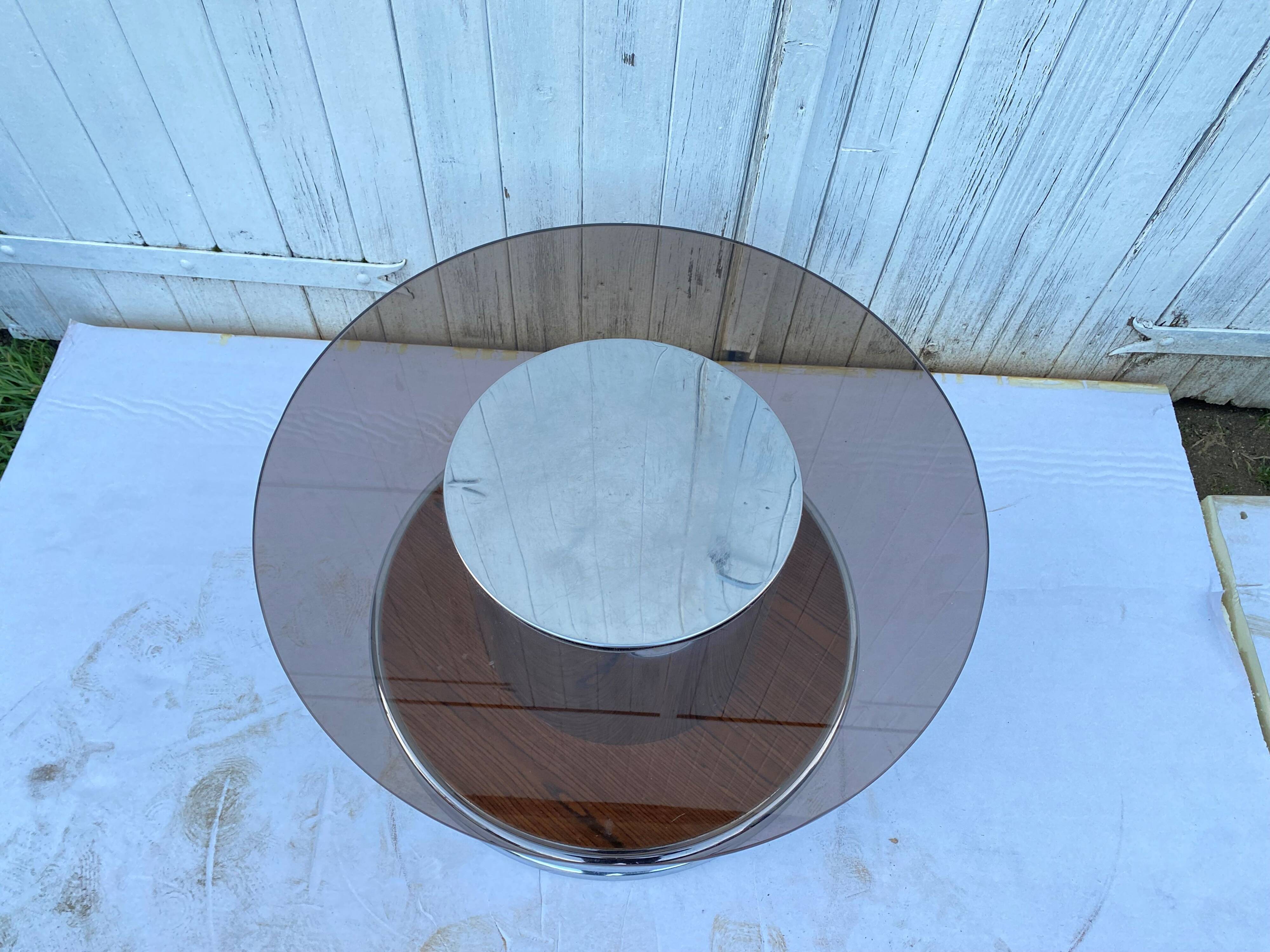 Round coffee table in smoked glass, chromed metal and wood, 1960s