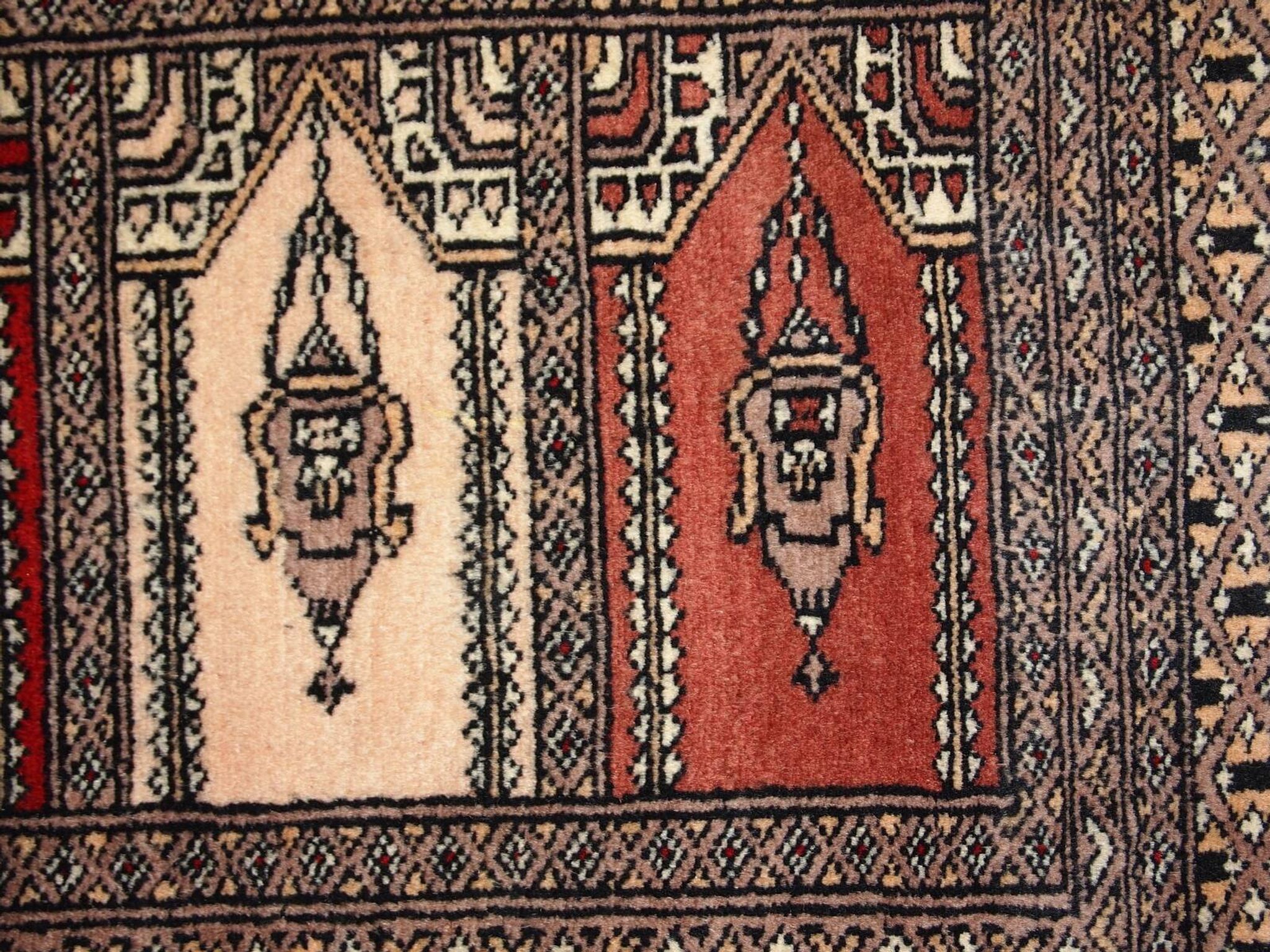 Tapis vintage fait main Bukhara de prière en laine rouge (45cm x 101cm)