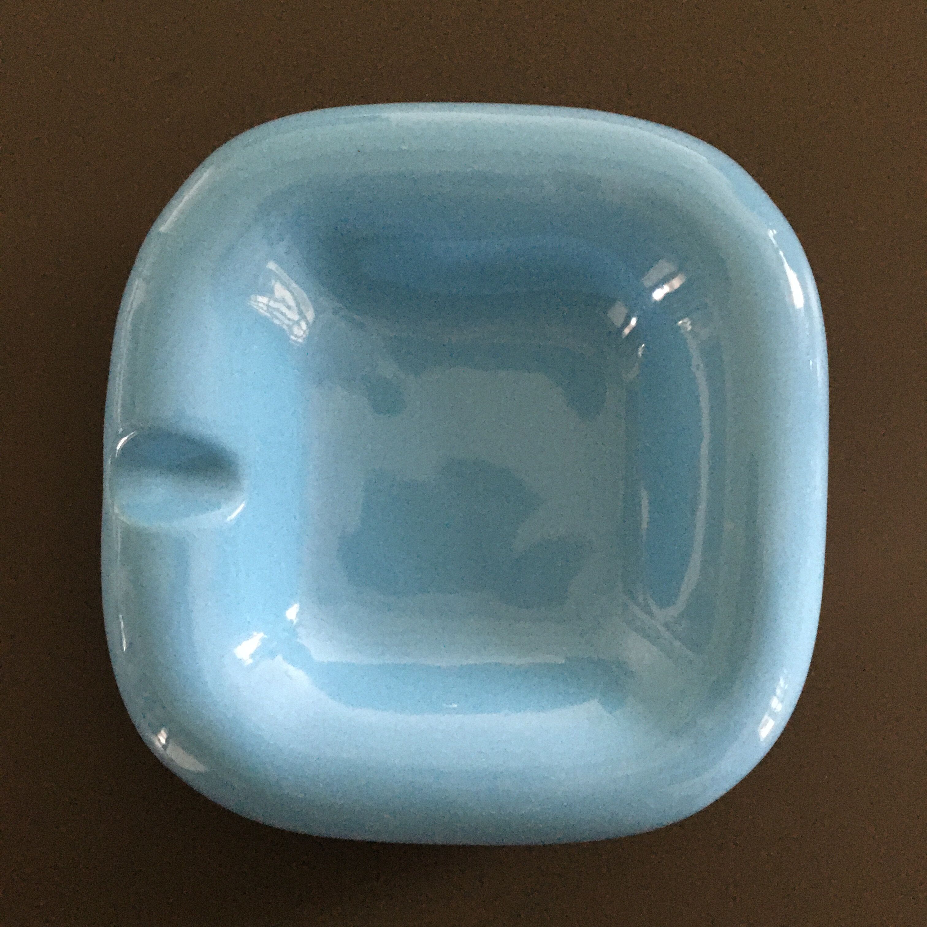 Empty turquoise earthenware pocket