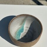 Small brown bowl inside blue and white