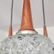 Mid Century Modern spider chandelier in teak, rosewood, and crystal.