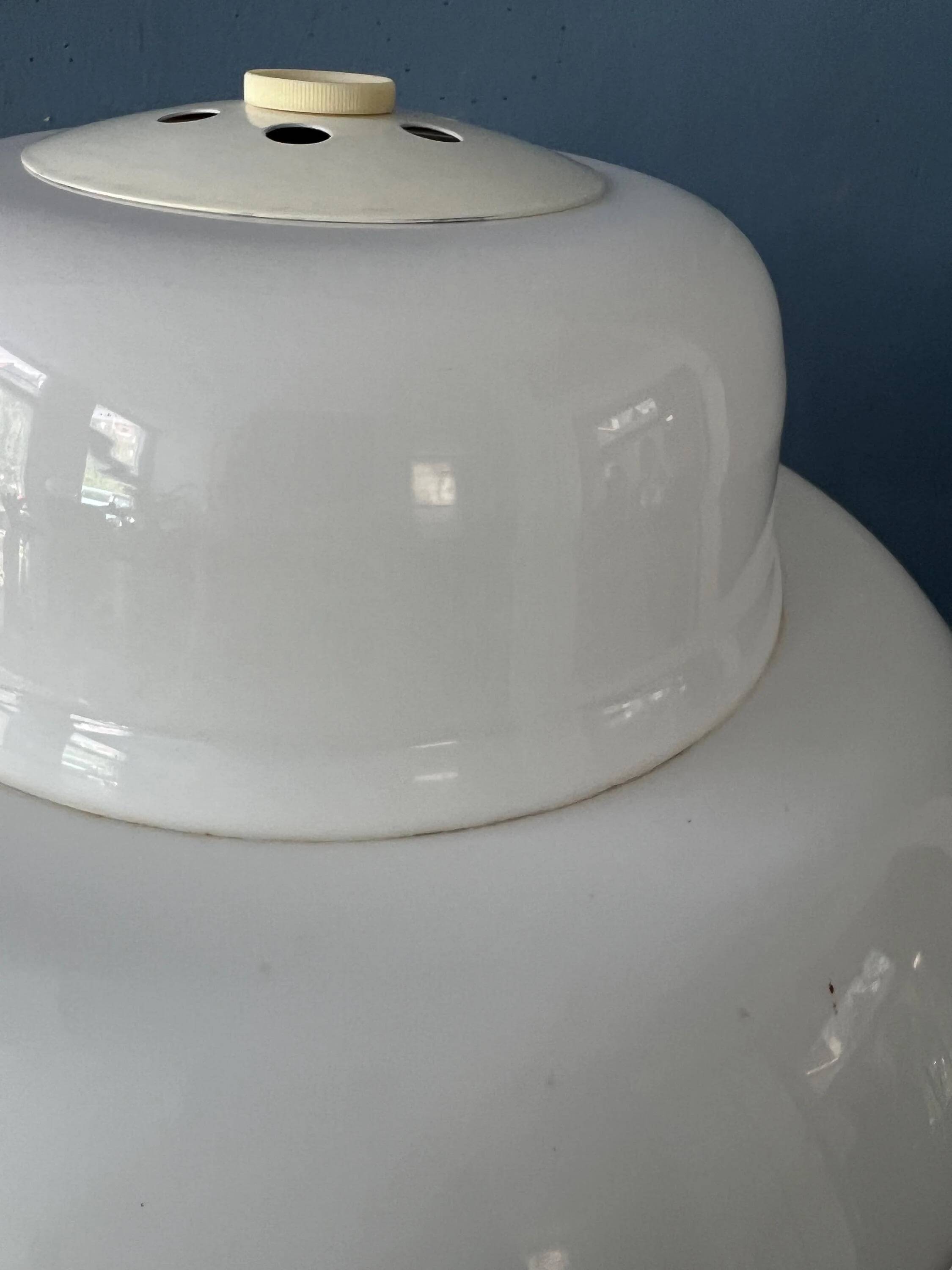 Mid-century mushroom floor lamp with a white plexiglass shade.