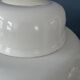 Mid-century mushroom floor lamp with a white plexiglass shade.