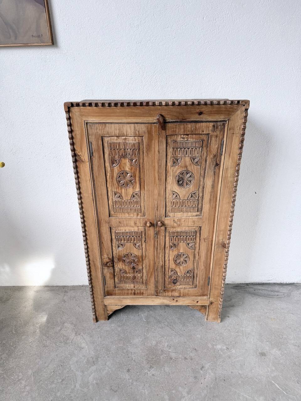 Small cabinet in folk art style
