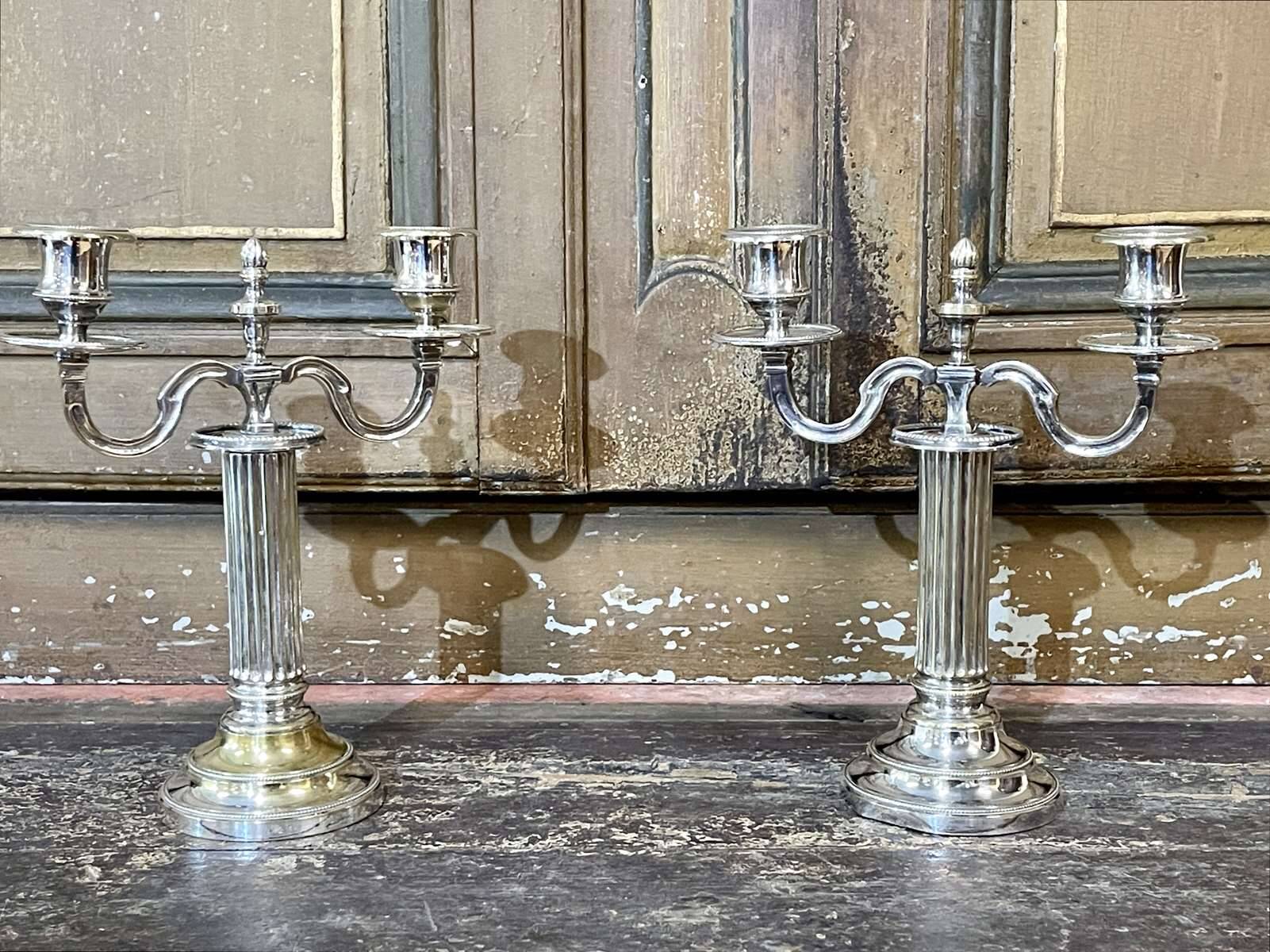 Pair of 2-branched candlesticks in silver metal