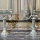 Pair of 2-branched candlesticks in silver metal