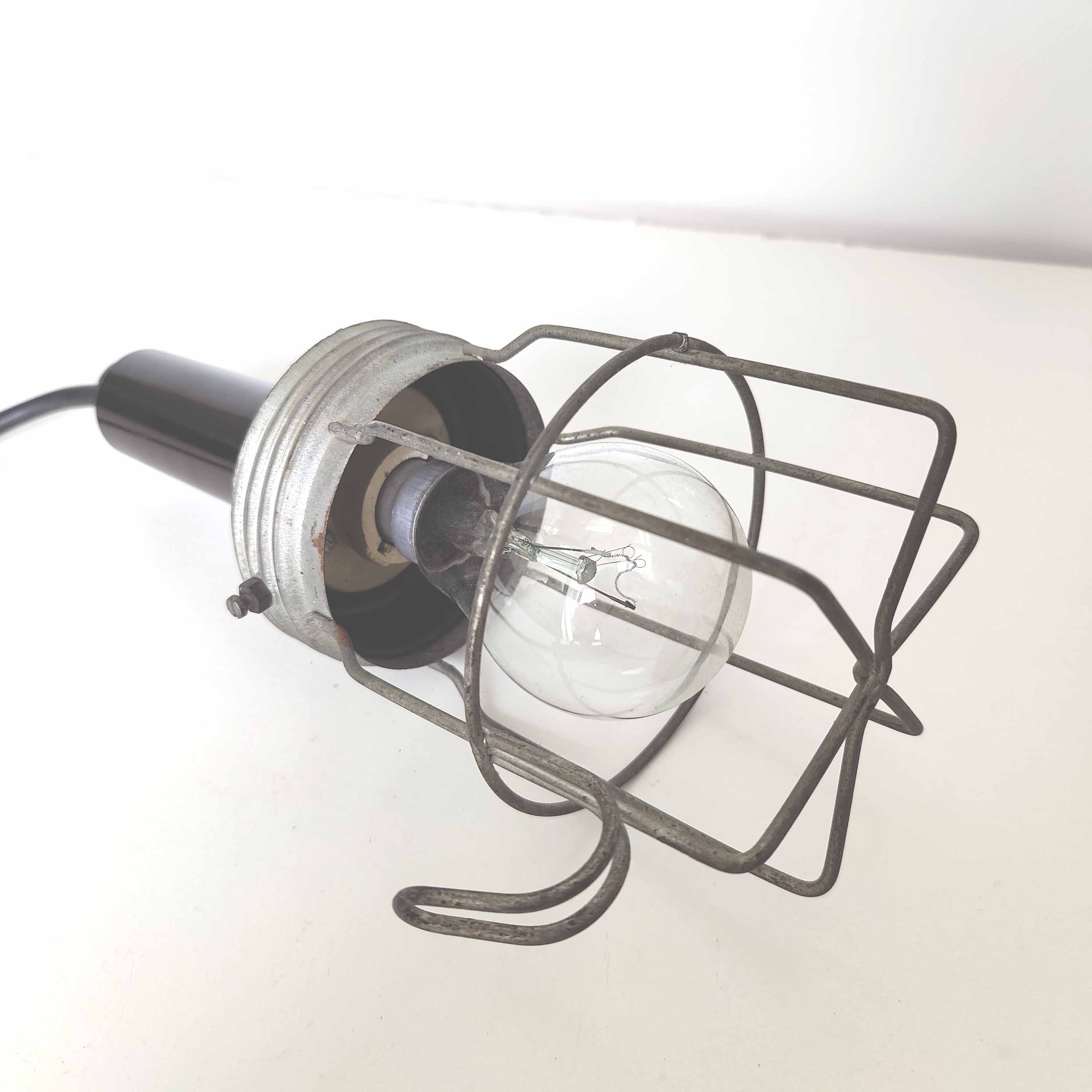 Black walking lamp from an industrial workshop