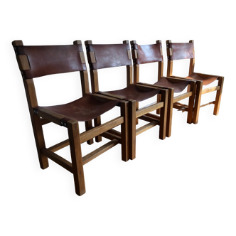 Série de quatre chaises Maison Regain en cuir