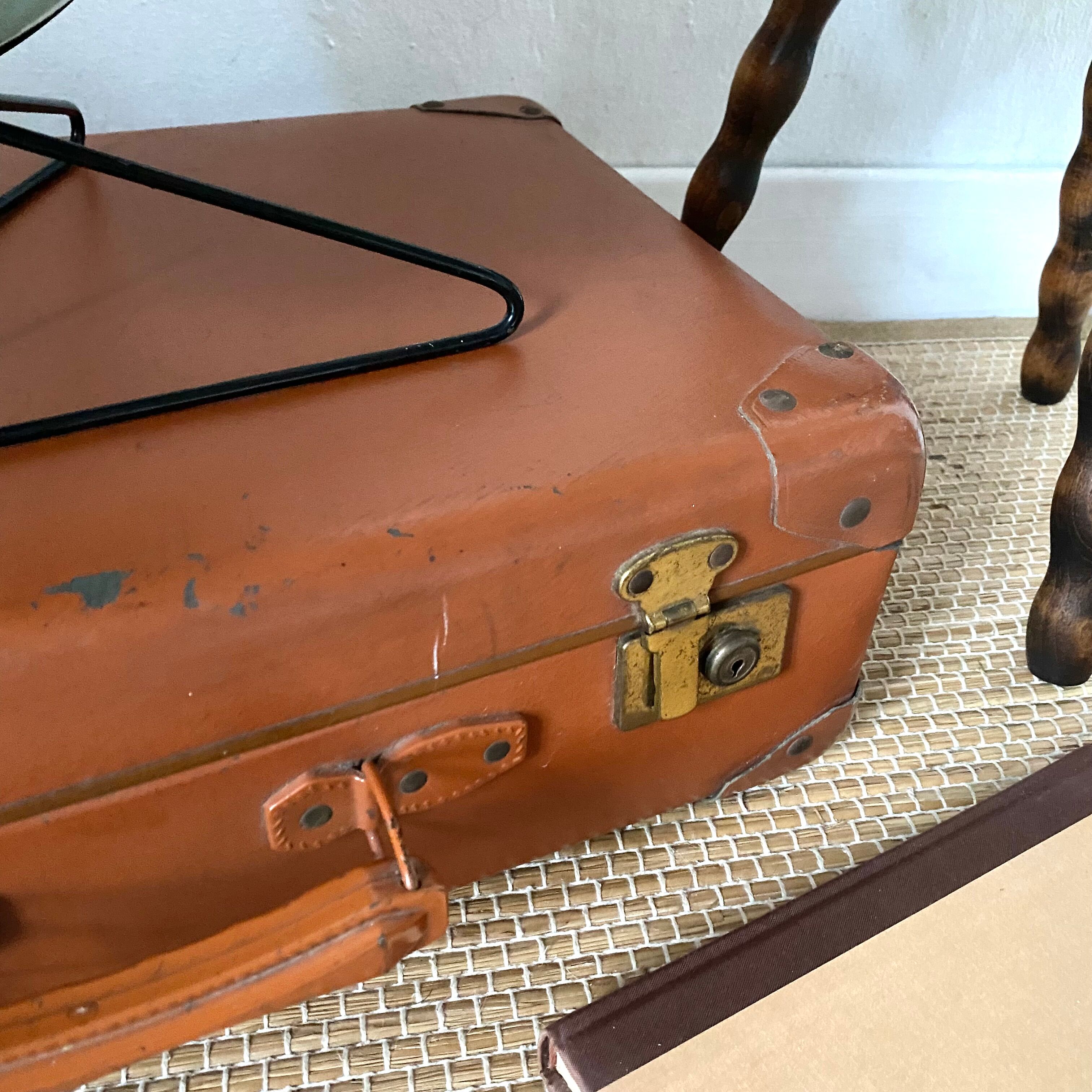 Antique suitcase and its key